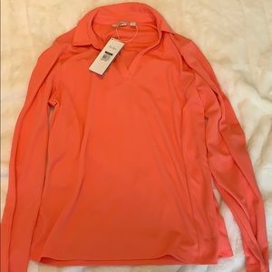 Women’s coral long sleeve golf shirt